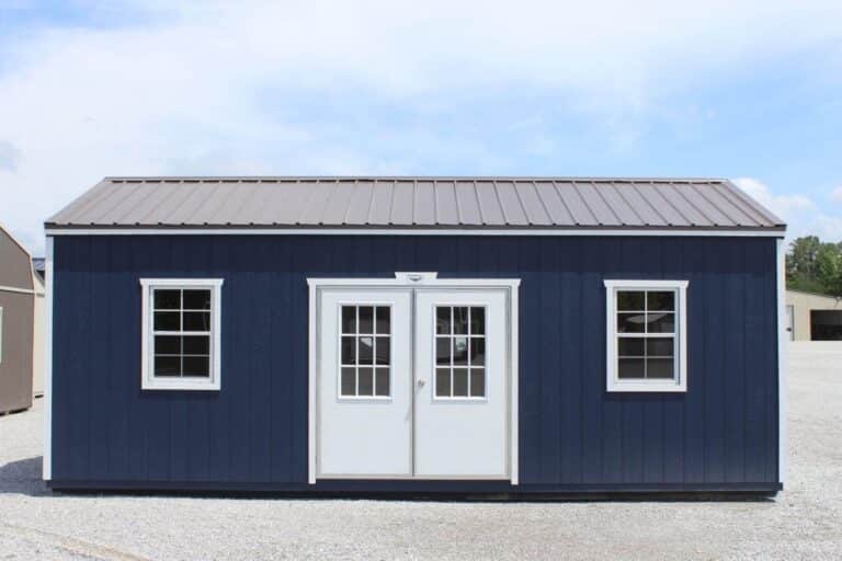 blue shed with white double doors