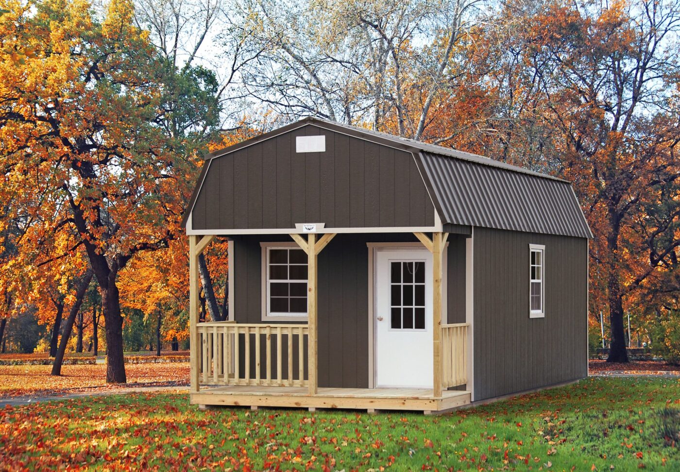 a dark brown cabin shed with a front porch for sale in cord AR