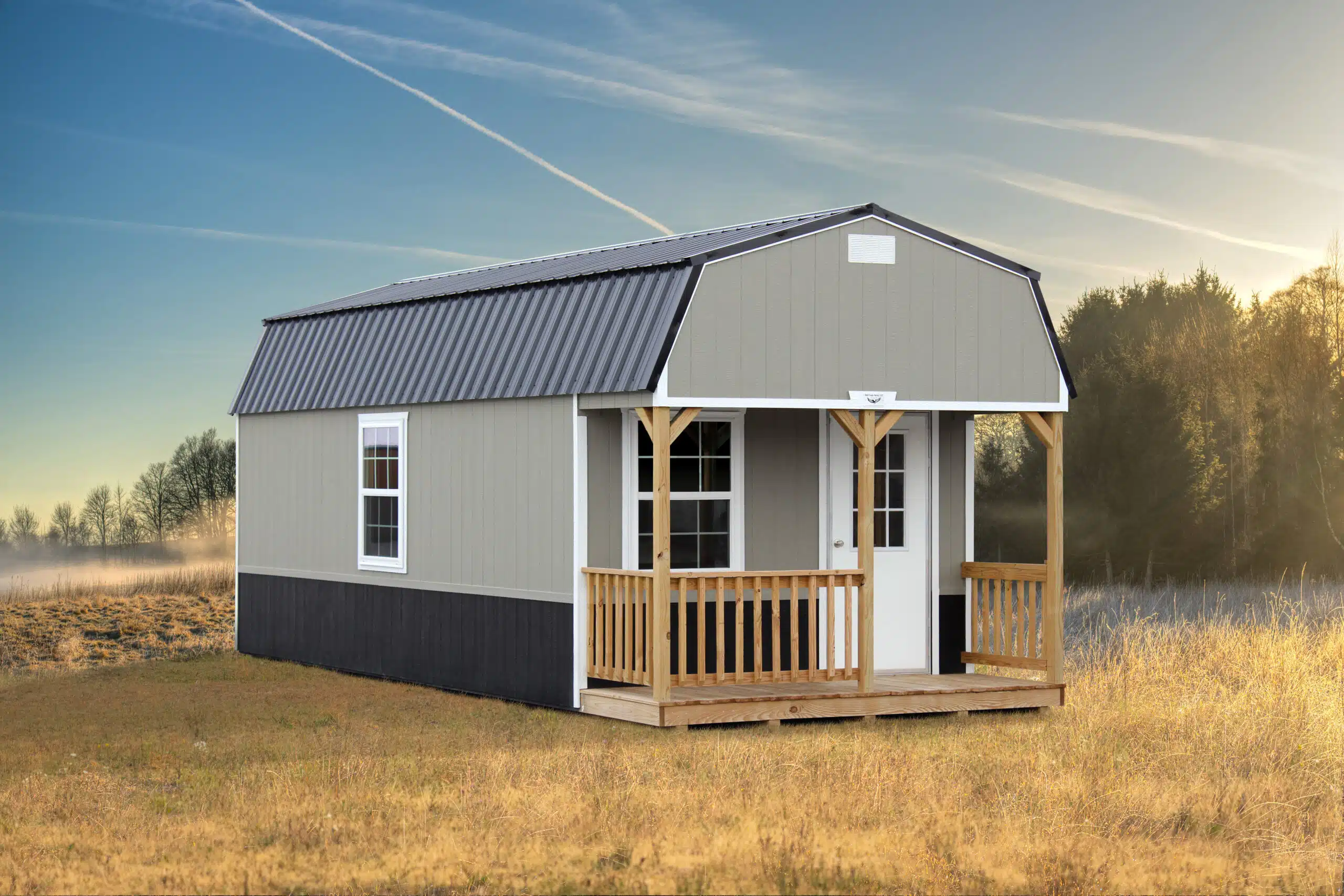 barn cabin grey roof wood trim