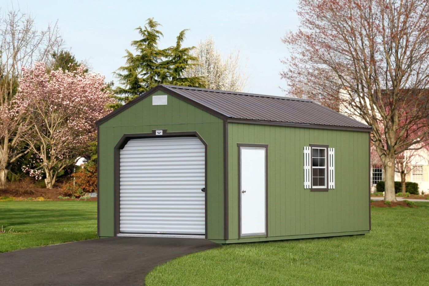 a green garage shed with grey trim and a grey metal roof for sale in cord AR
