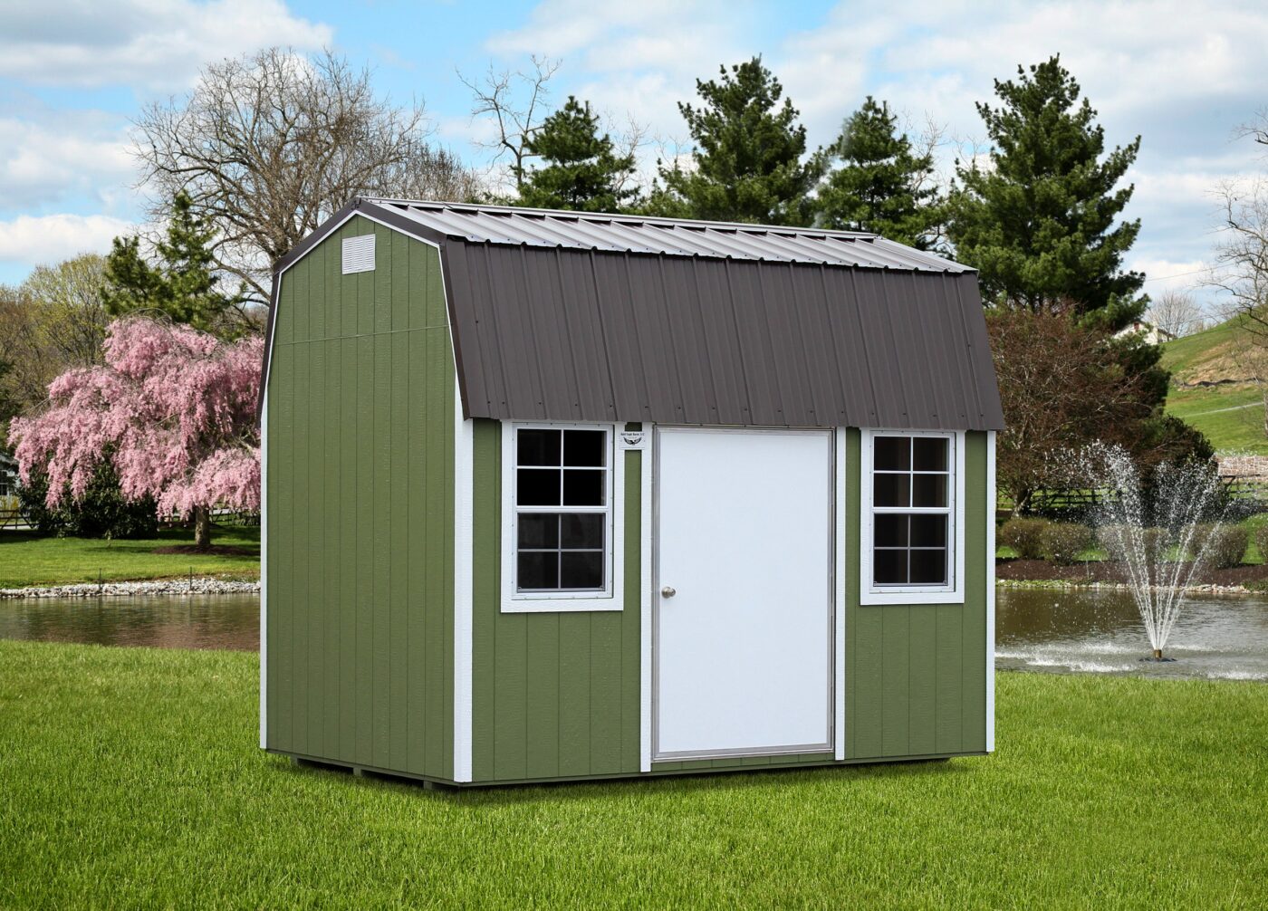 a green portable side barn shed with white trim, a dark grey metal roof, and a white door for sale in bradford AR