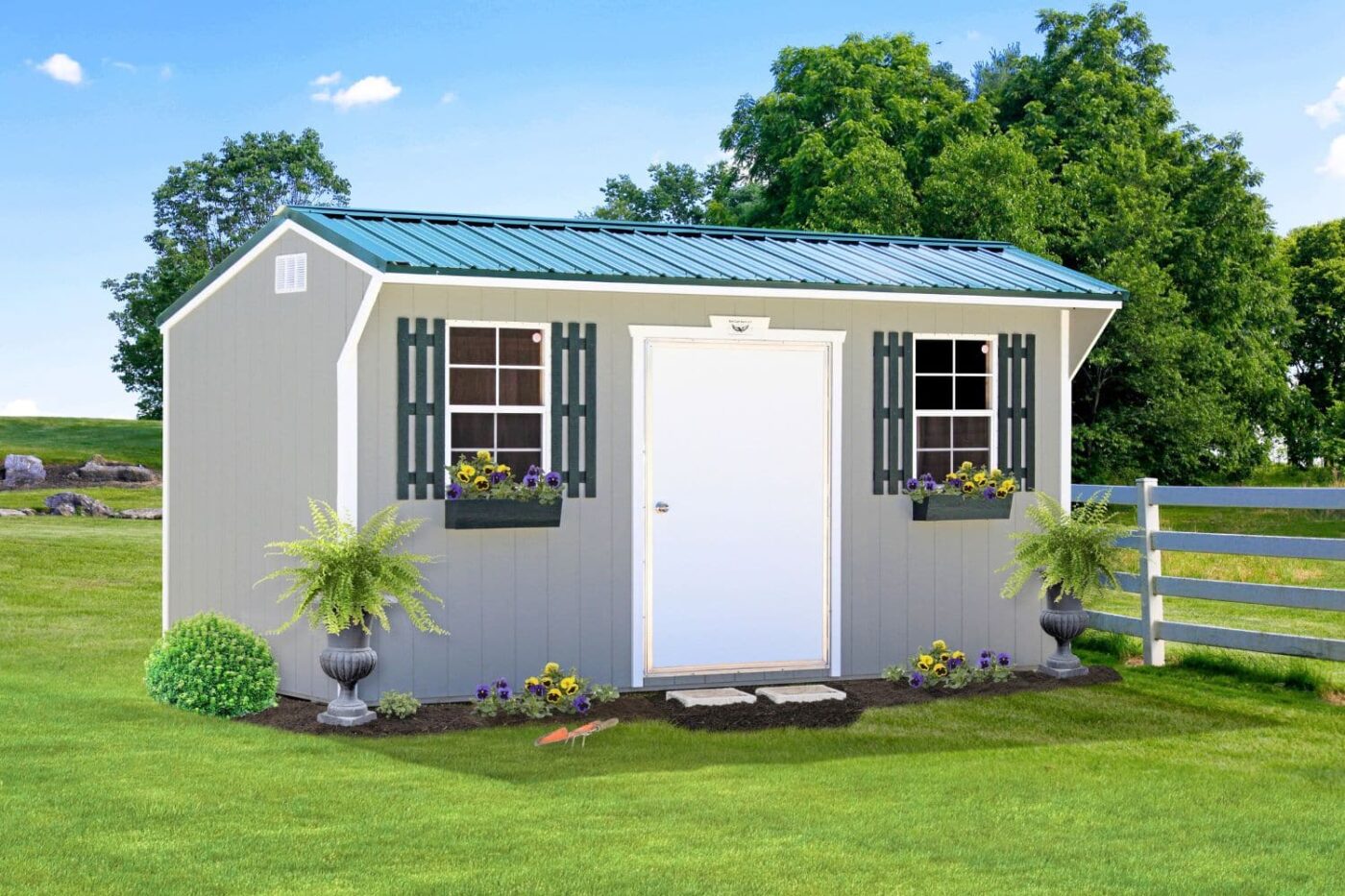 a grey specialty shed with white trim and a blue metal roof for sale in cord AR